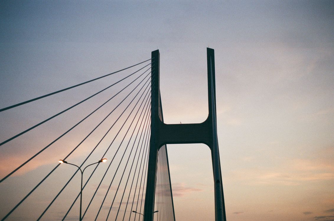 Grey Line Bridge Gray Bridge Under Blue Sky · Free Stock Photo