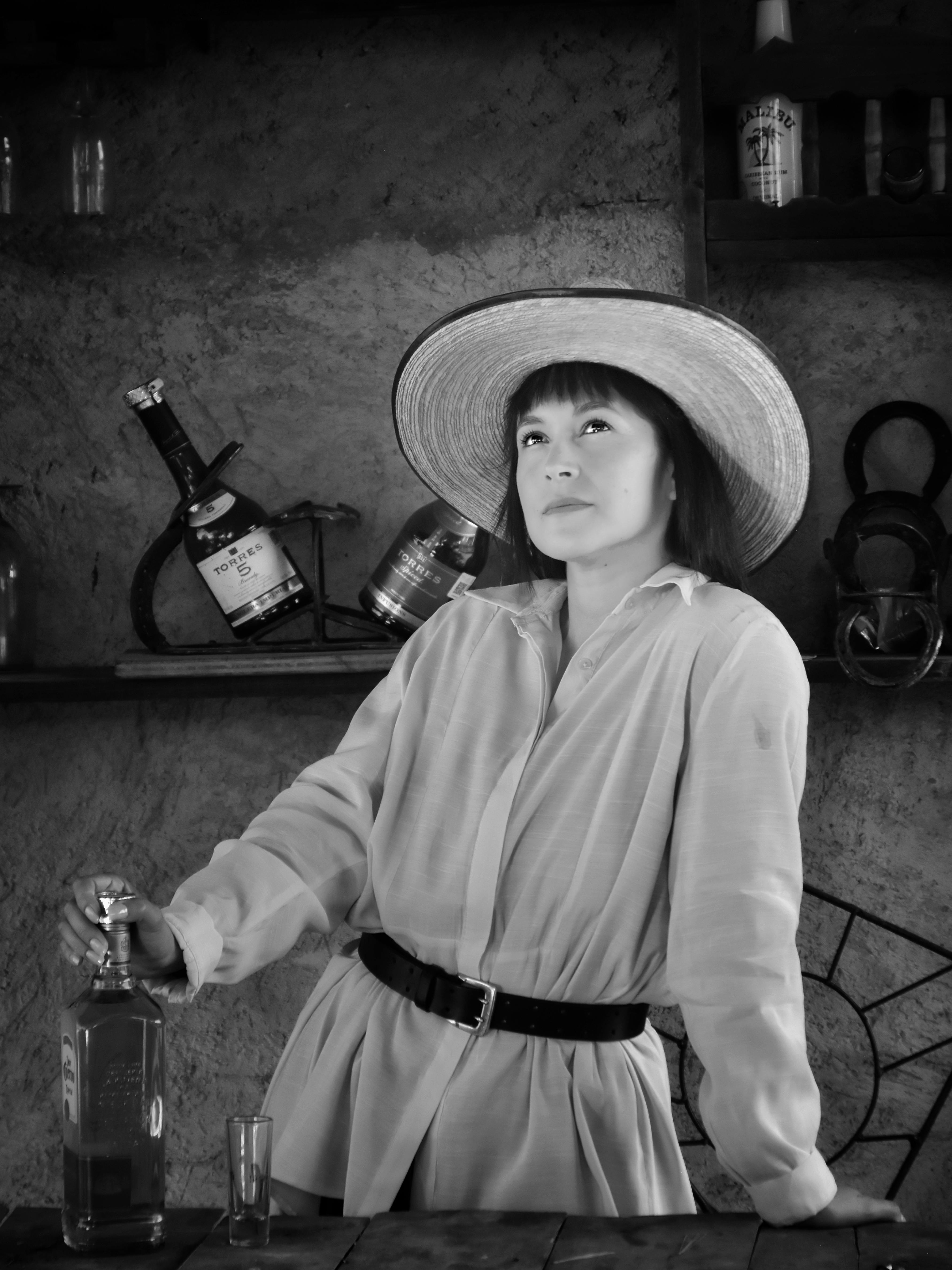 Grayscale Photography Of Woman Wearing Coat And Fedora Hat · Free Stock Photo