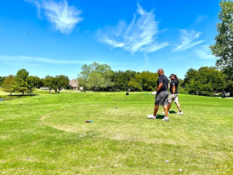 Two Men Playing Golf