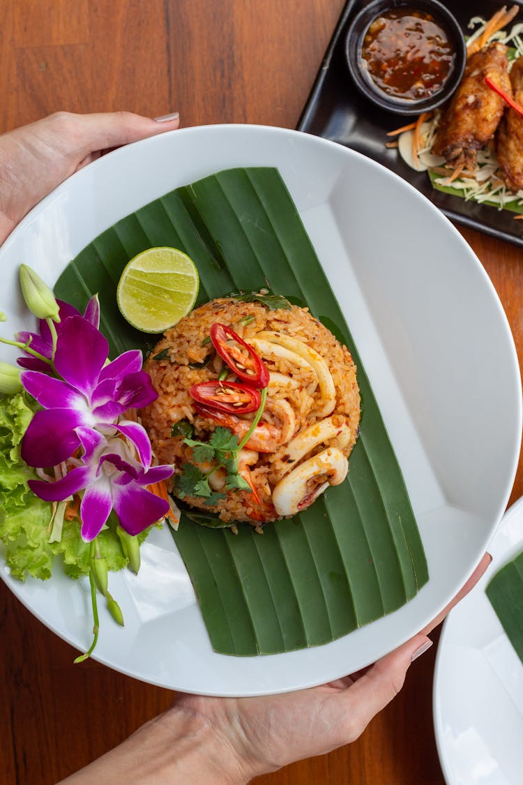 Tom Yum Seafood Fried Rice On White Ceramic Plate