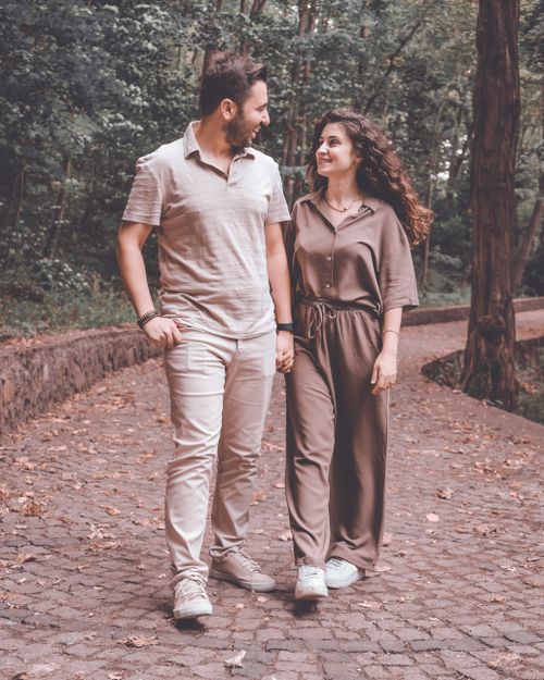 Free A couple enjoys a romantic walk in Beykoz Park, Istanbul on a pleasant day. Stock Photo