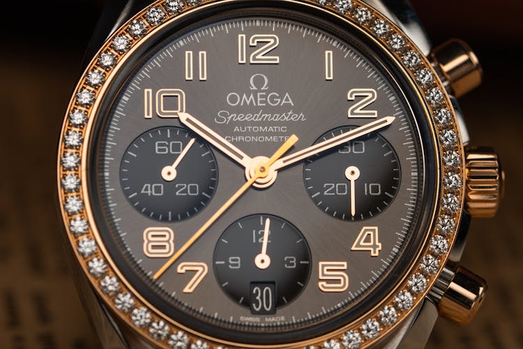 Gold And Black Chronograph Watch