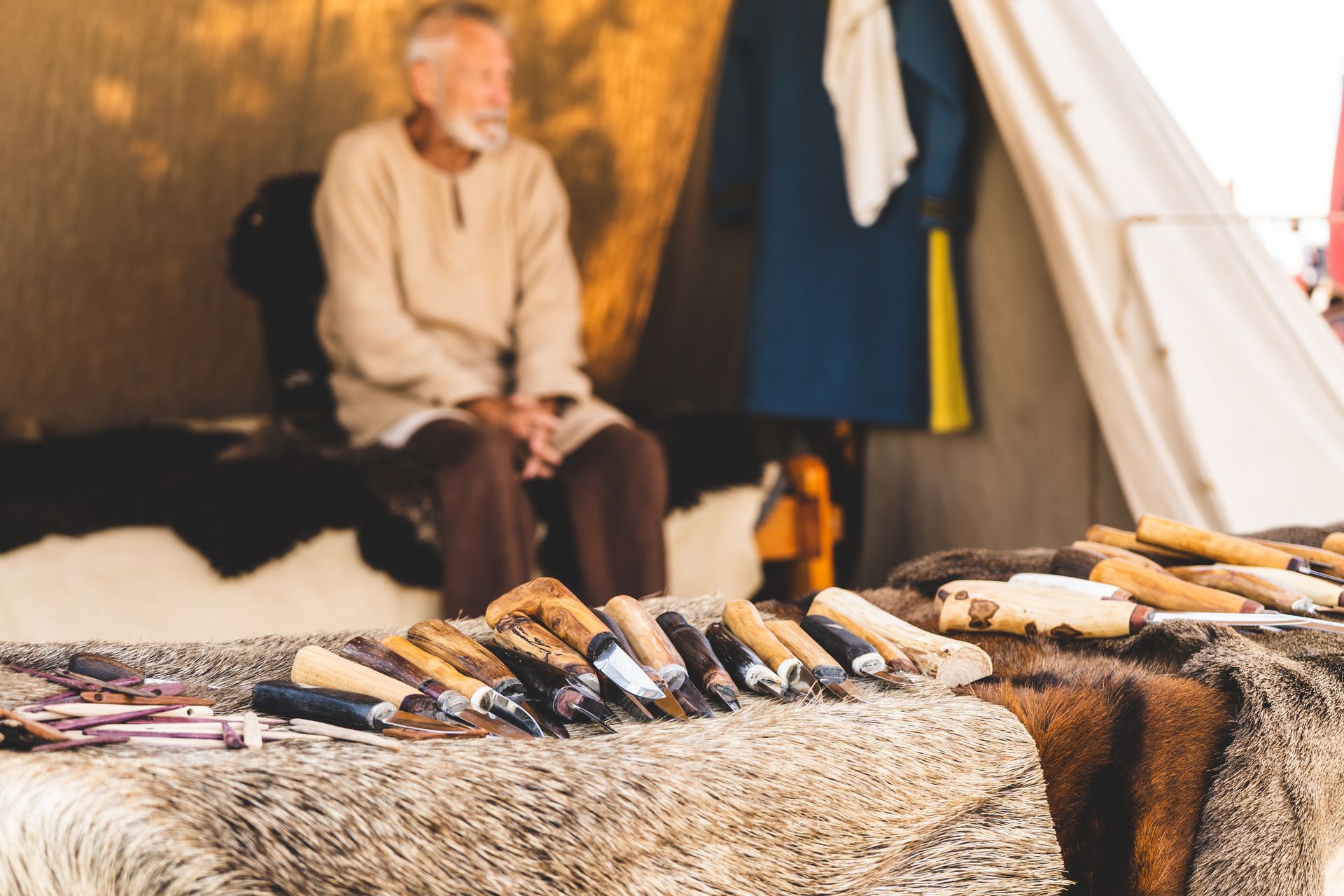 Knives on Fur in Front of Man