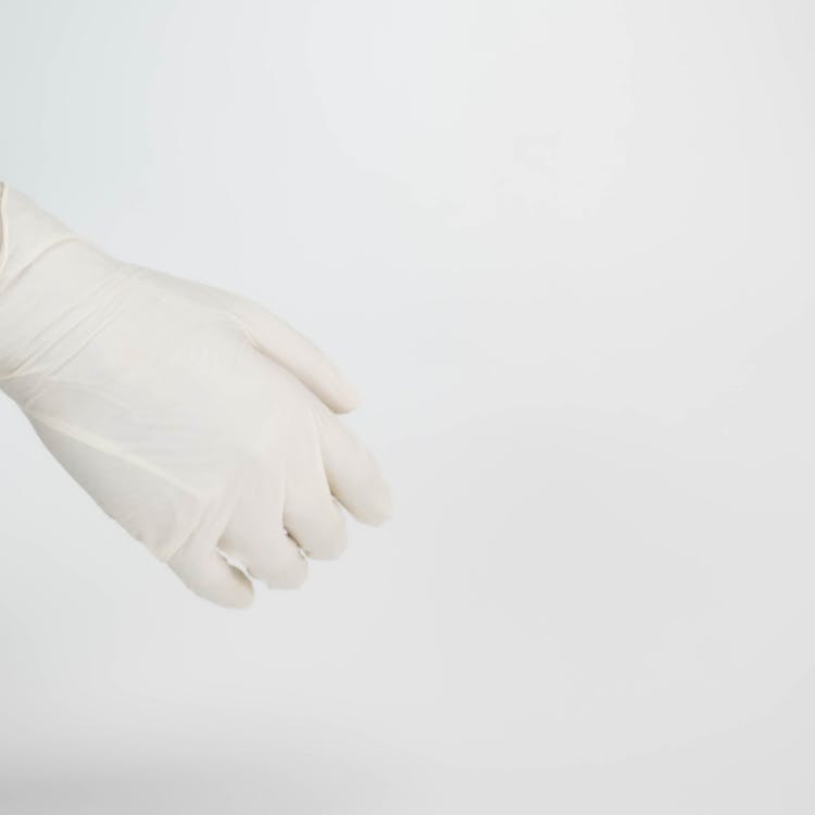 Person Wearing White Glove