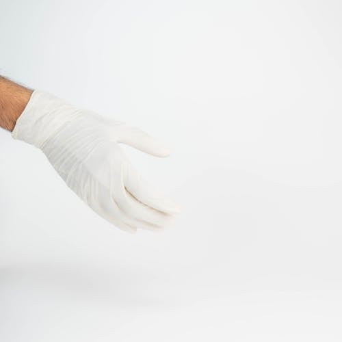 Foto profissional grátis de fechar-se, fundo branco, luva de borracha