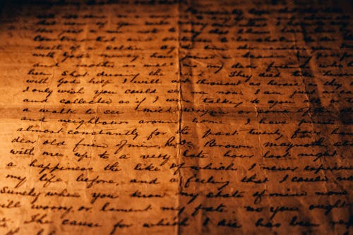Close-up of Handwriting on an Old Vintage Paper Scroll