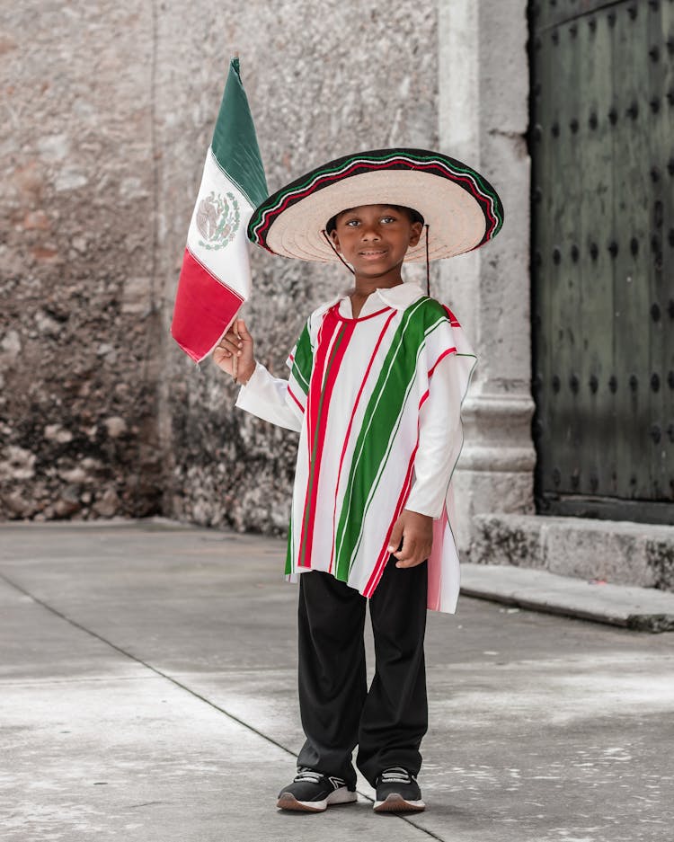 Boy Holding Mexican Flag