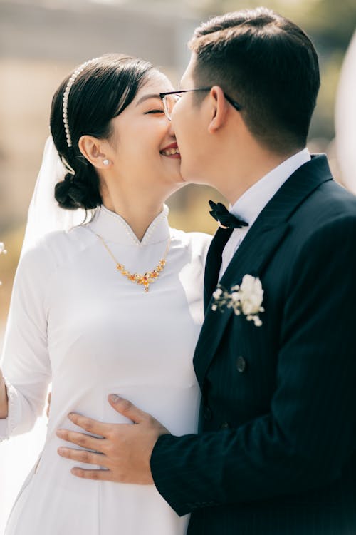 Bride and Groom Kissing in the Wedding