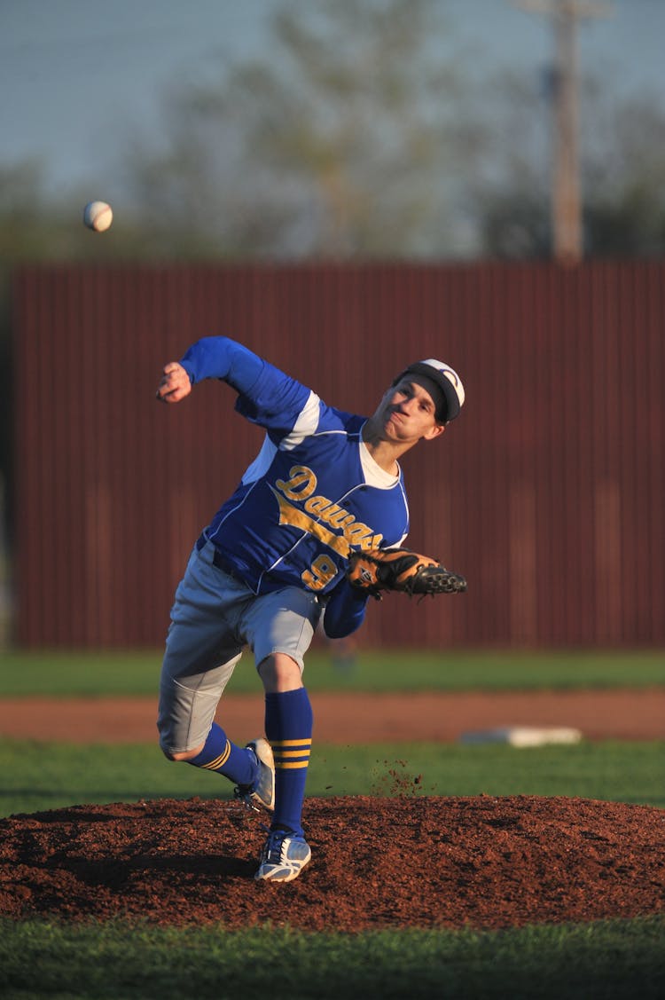 Man Throwing The Baseball