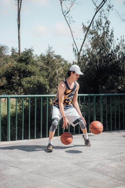 Kostnadsfri bild av basketboll, basketspelare, bollar