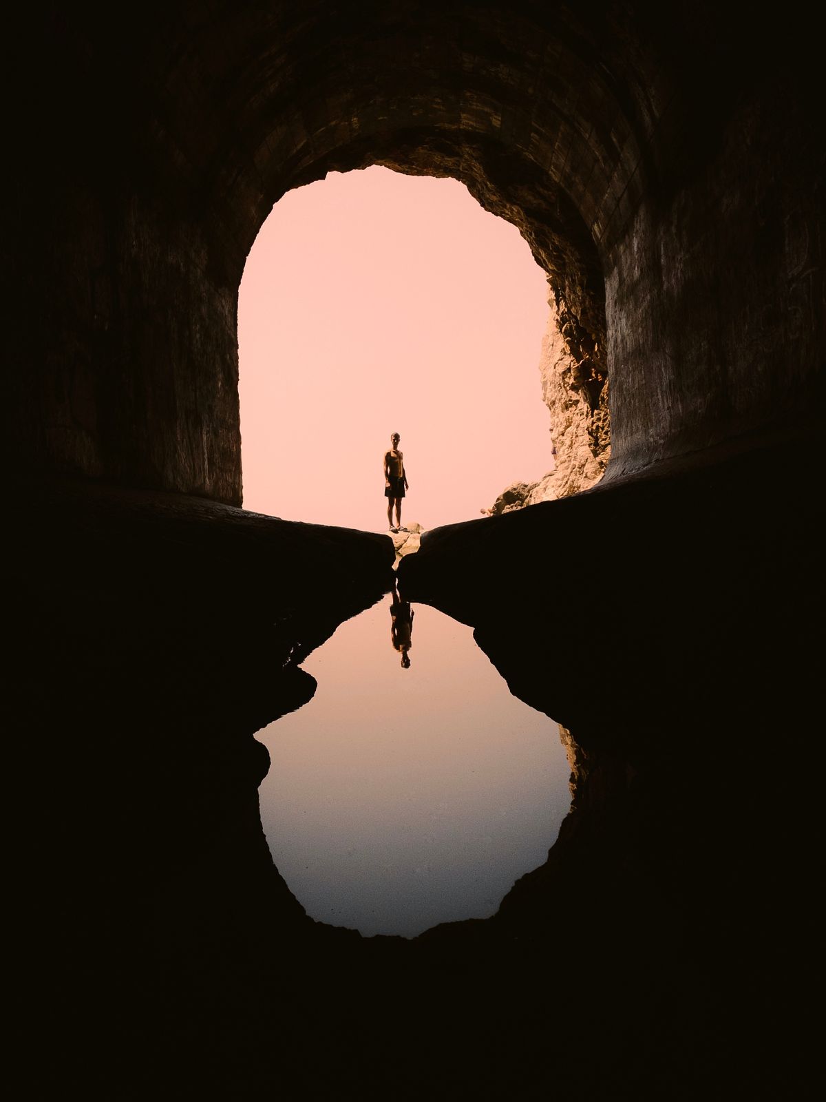 The entrance to an underground cavern with natural light