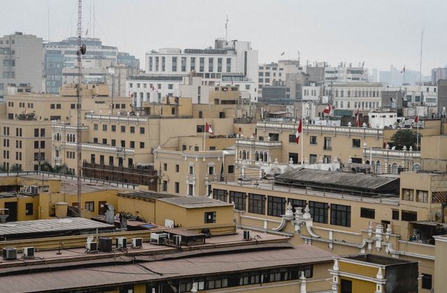 Aerial view of the historic urban landscape in Lima, Peru, showcasing classic architectural styles. — arriving in Lima