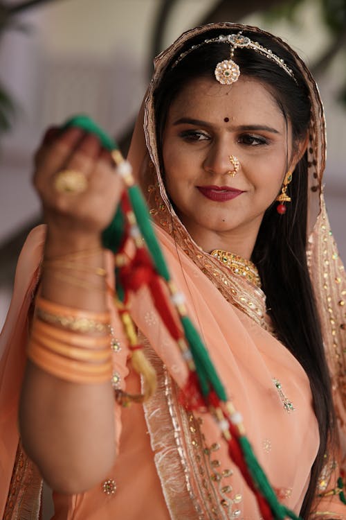 Portrait of Smiling Woman in Traditional Clothing