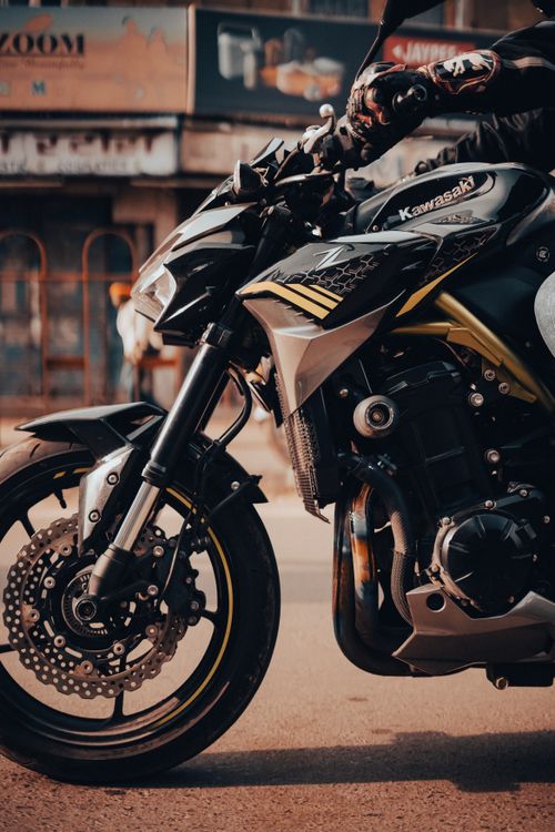 Free Close-up of a motorcycle rider on city streets in Jodhpur, India. Energetic urban scene. Stock Photo