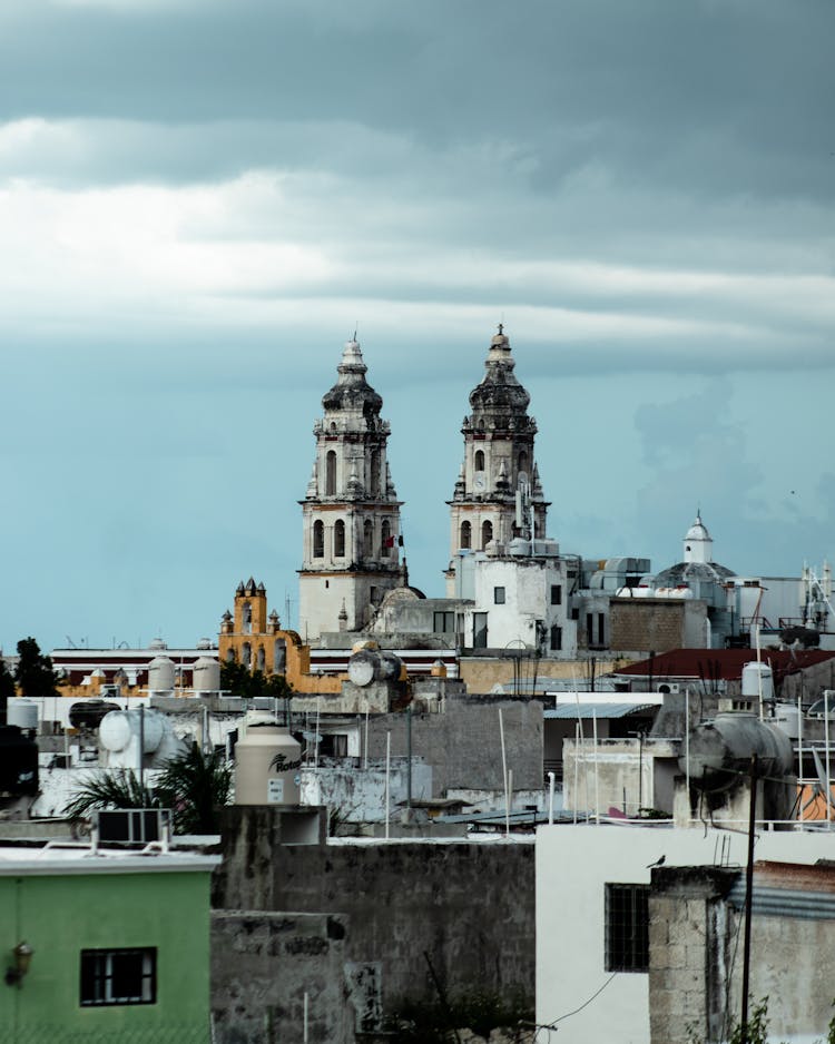 City Buildings Roofs Against Sky Background