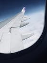 View of Airplane Wings from Inside a Plane
