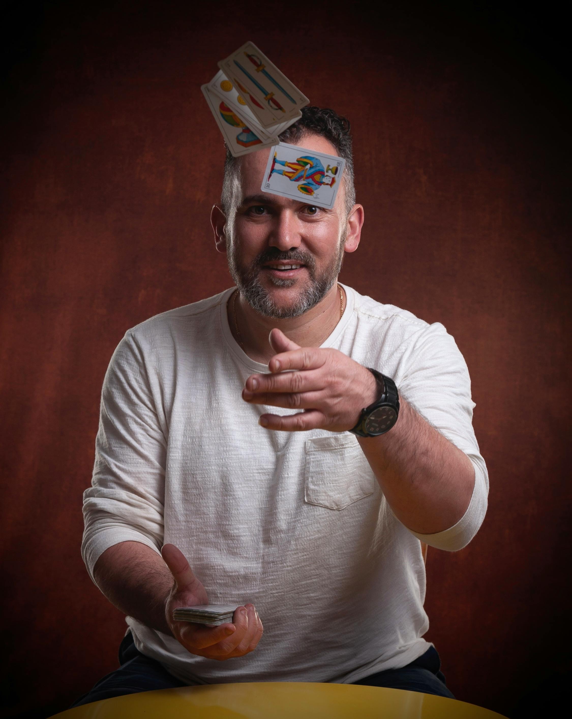 Man Throwing Cards · Free Stock Photo