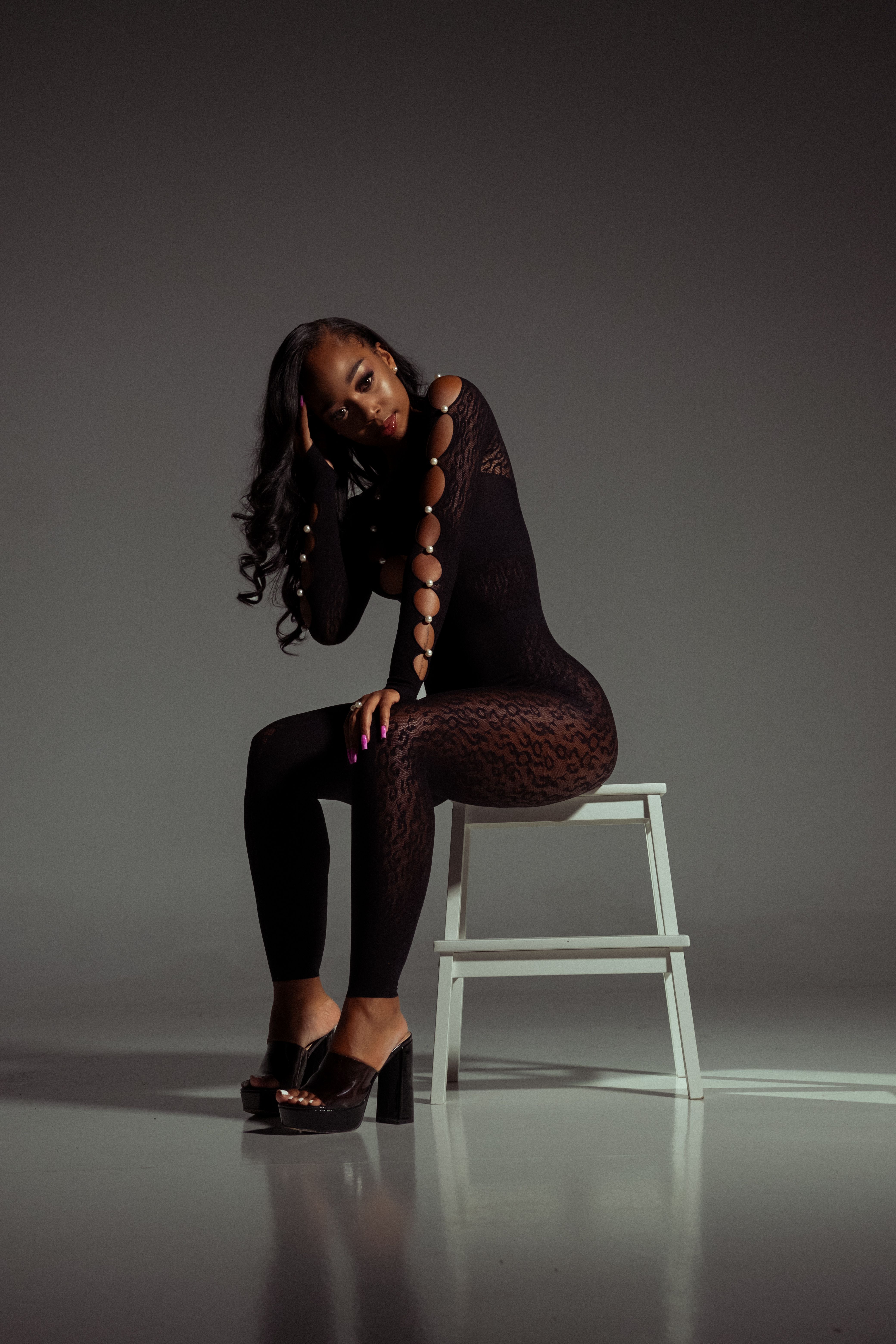 A Woman in Black Pants Sitting on the Chair · Free Stock Photo