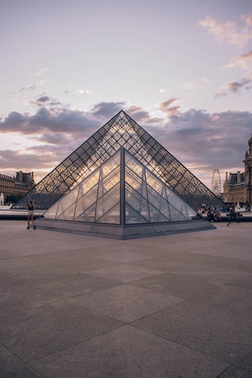 A Louvre Museum Under the Cloudy Sky