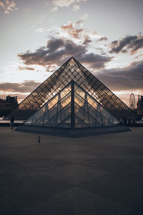 A Louvre Museum Under the Cloudy Sky