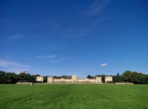 White Concrete Palace Under Blue Skies