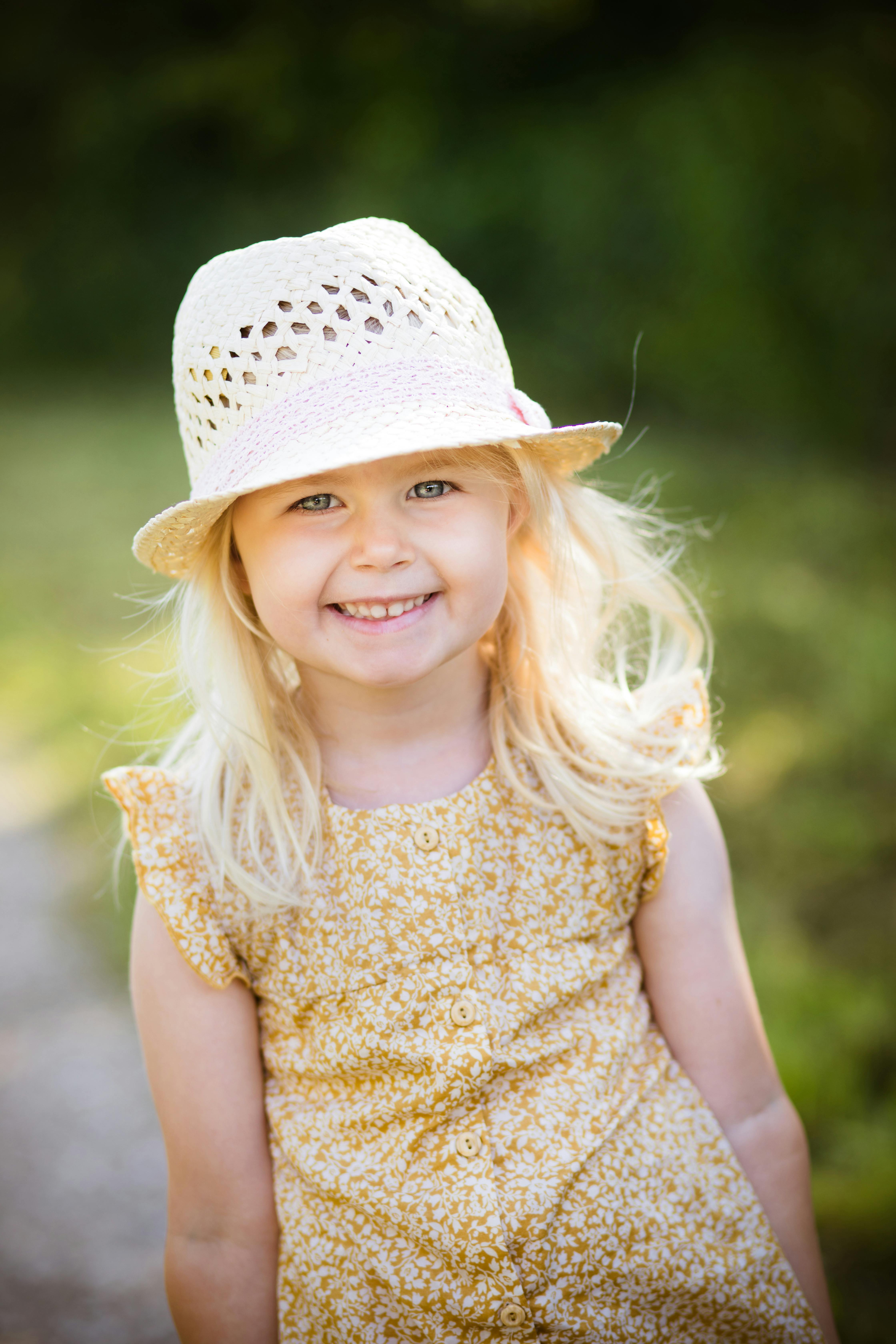 Close Up Photo of a Girl Wearing a Hat · Free Stock Photo