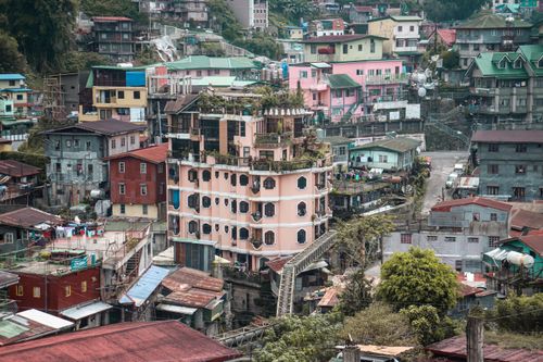 Free Explore the vibrant and diverse residential architecture captured from above in Baguio, Philippines. Stock Photo
