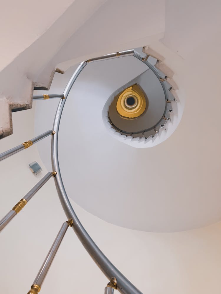 Photo Of A White Spiral Staircase