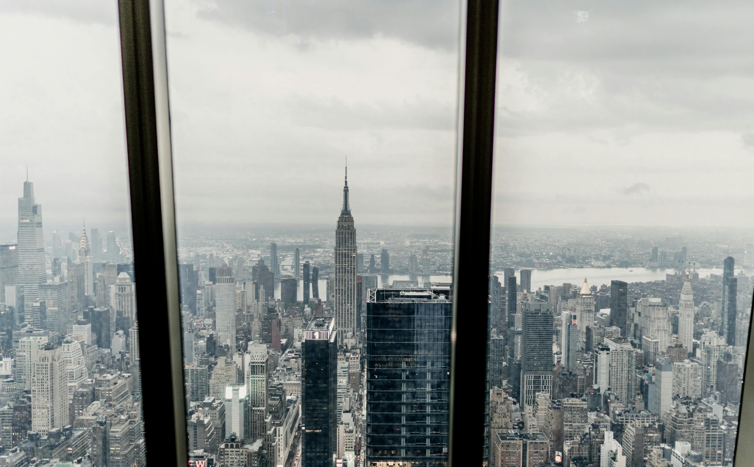Glass Windows Overlooking City Buildings · Free Stock Photo