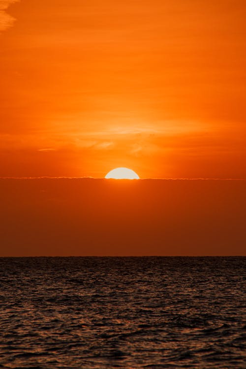 Free A Sunset over a Seascape Stock Photo