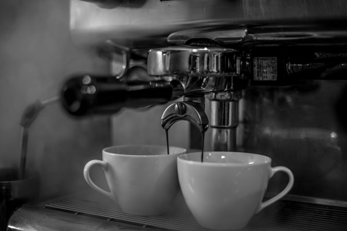 Grayscale Photograph of Cups with Brewed Coffee · Free Stock Photo
