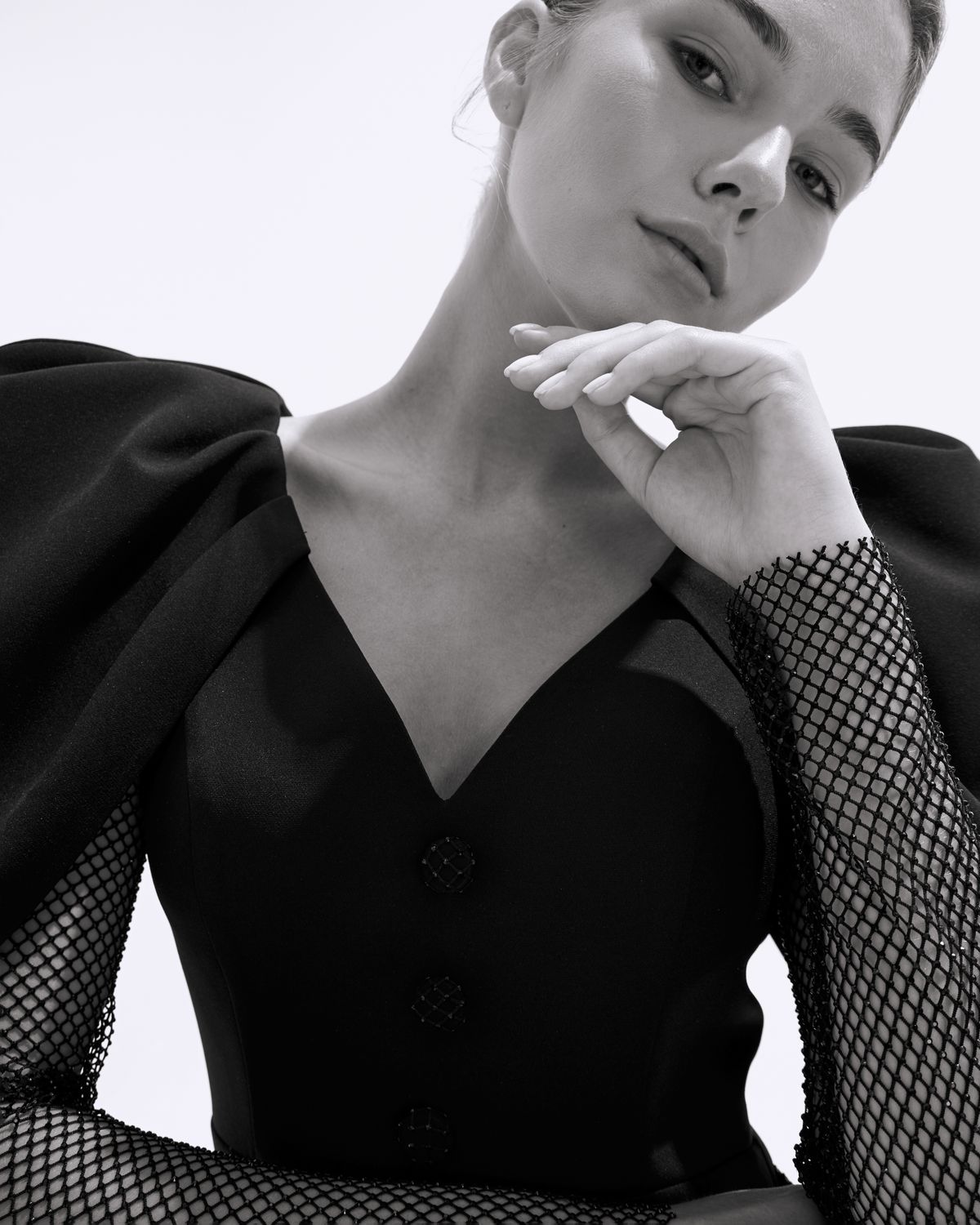 A timeless portrait of a woman in black — the enduring elegance of the black dress