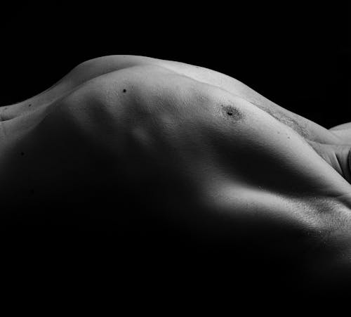 Free Grayscale Photo of a Man's Chest Stock Photo