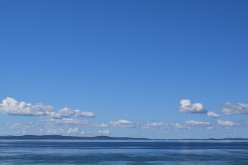 Gratis stockfoto met blauwe lucht, buiten, gebied met water