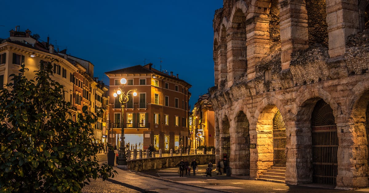 Stunning view of Verona Arena and surrounding architecture at dusk, showcasing Italian urban beauty.