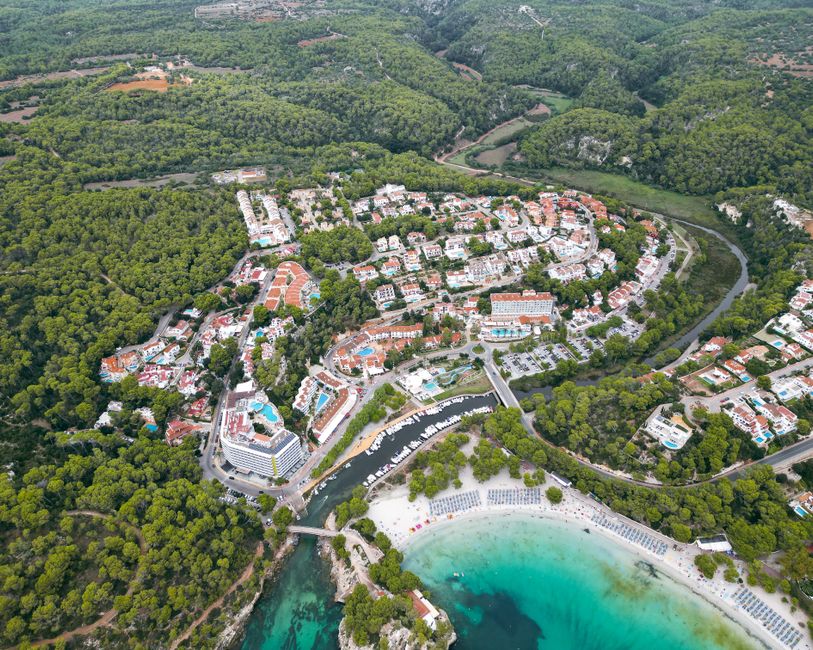 Stunning Palma de Mallorca North Coast Tour by Helicopter Private Review 2026 - Stunning aerial view of Cala Galdana's beautiful beach and lush landscape in Spain, perfect for travel and adventure enthusiasts.