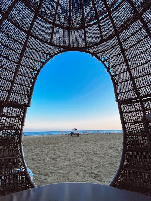 Beach under Clear Sky behind Tent