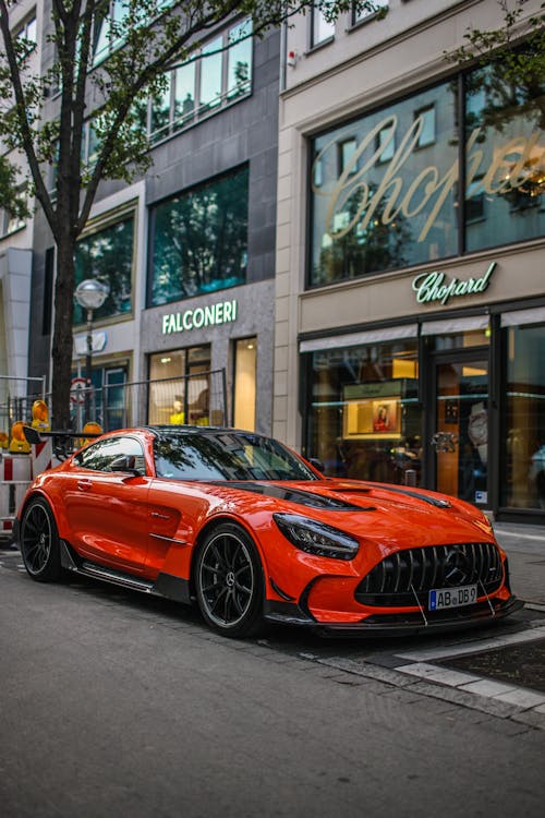 A Red Car Parked on the Street