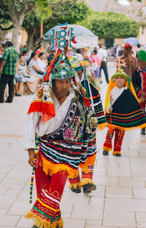 Free Colorful traditional dancers during a cultural festival in Papantla, Mexico. Stock Photo