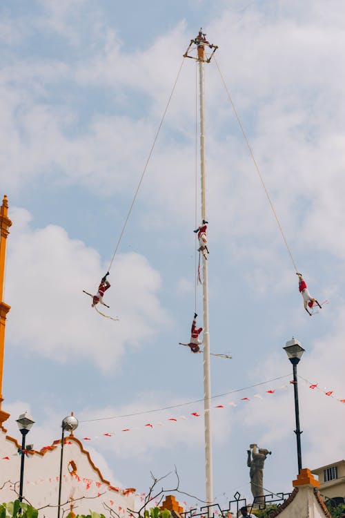 Flying Ropes Girl People Flying on Ropes on Traditional Festival · Free Stock Photo
