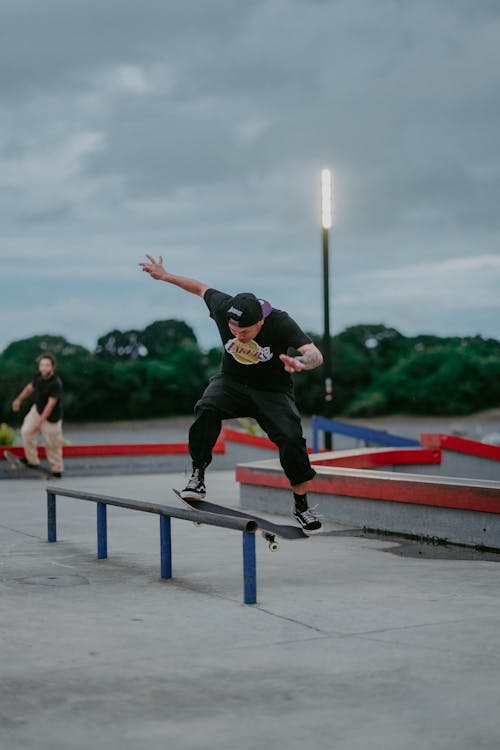 Man in Black Shirt Skateboarding