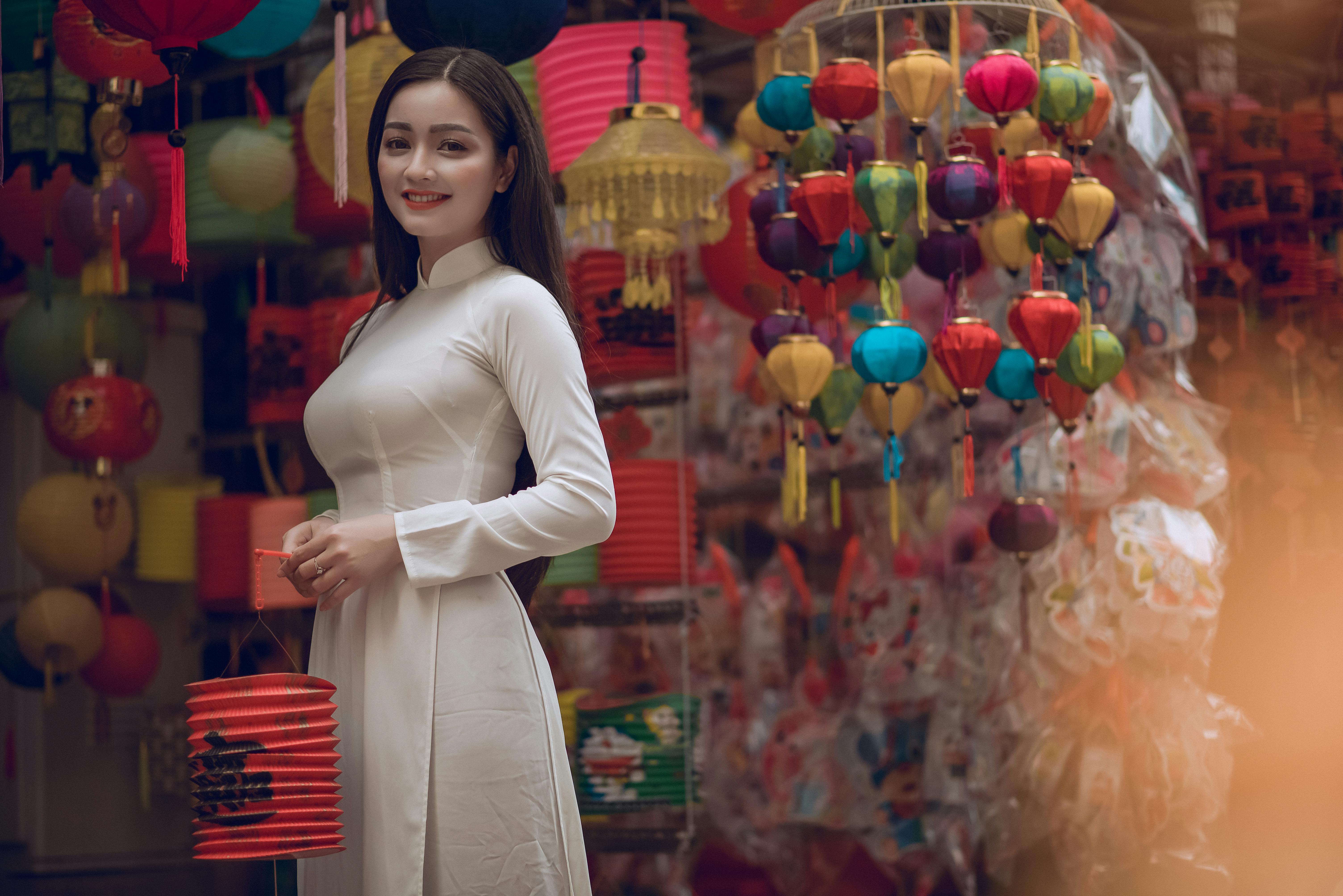 woman holding chinese lantern