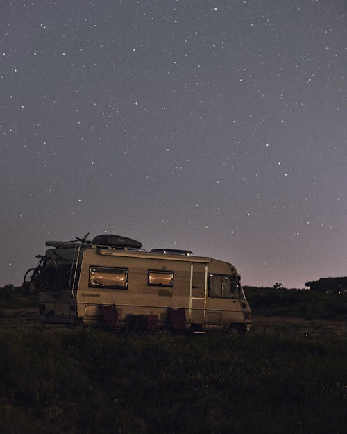 Free A Mobile Home under a Starry Night Sky Stock Photo