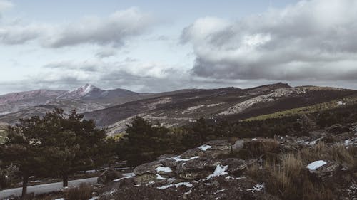 View of a Mountain Under the Cloudy Sky 