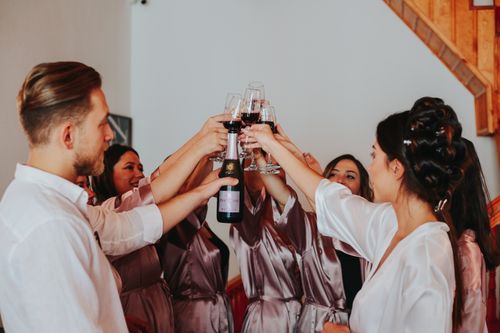 Free Group of friends toasting with wineglasses at a wedding celebration, creating a joyful and festive atmosphere. Stock Photo