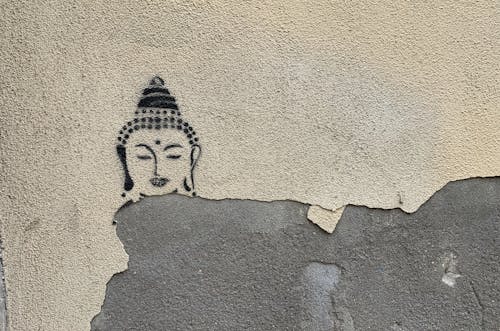  Wall with Buddha Head on Peeling Paint