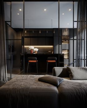 Sleek modern living room featuring luxury furniture and a stylish kitchen.