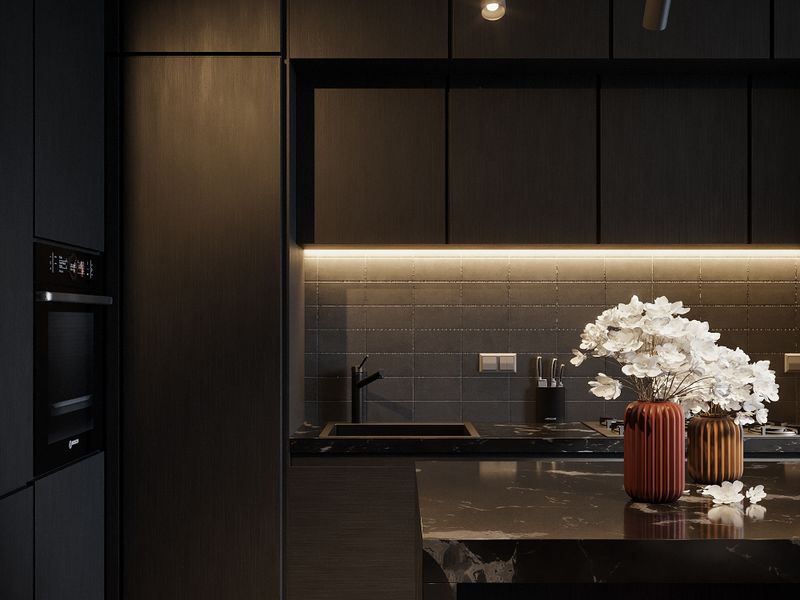 Thermador appliance that needs same-day repair A sleek, modern kitchen with a dark theme and illuminated cabinets, highlighting a stylish kitchen island