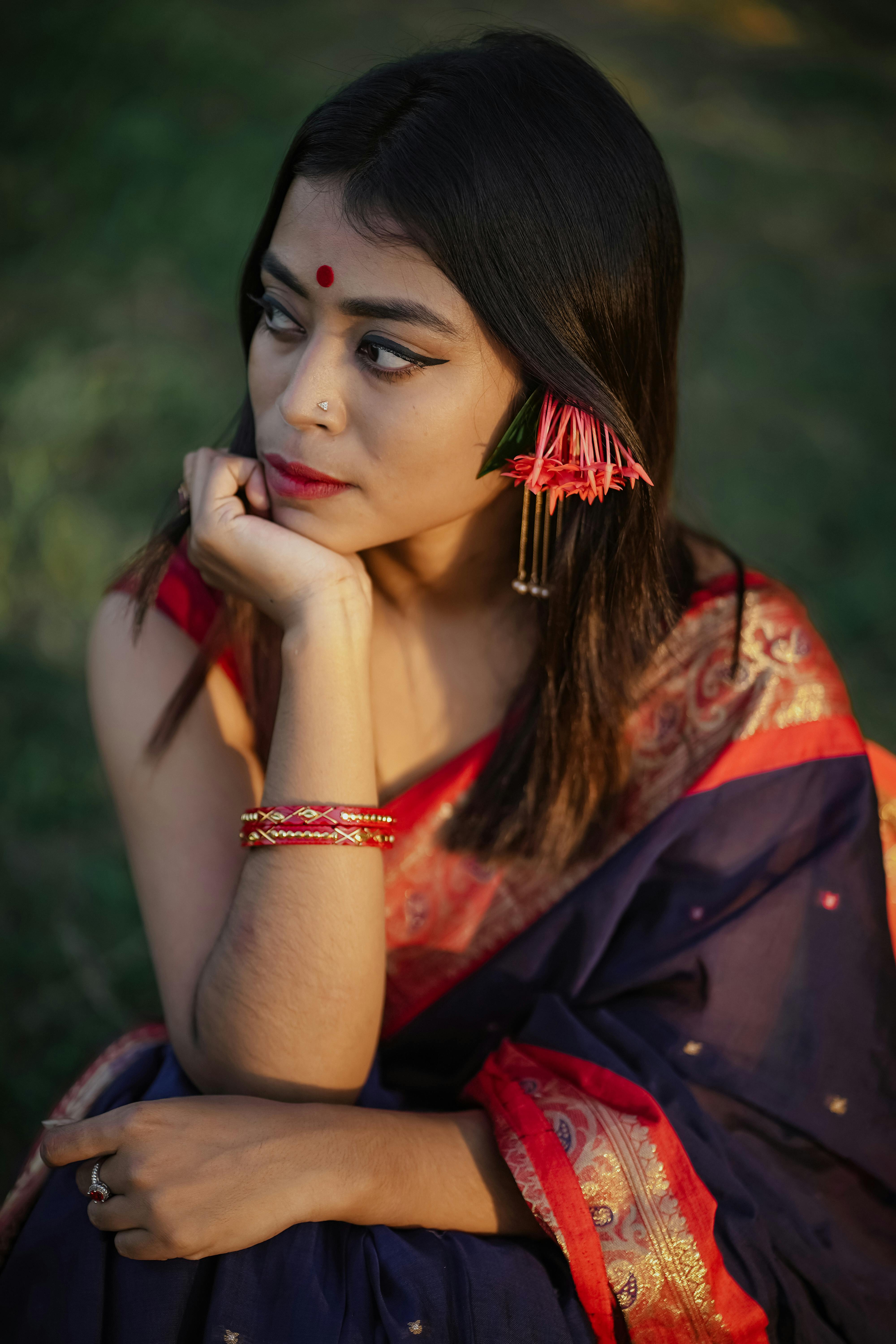 a realistic beautiful women in saree in long black hair