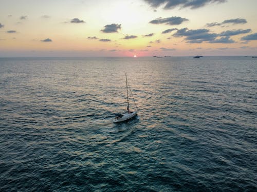 Δωρεάν στοκ φωτογραφιών με αεροφωτογράφιση, βάρκα, δύση του ηλίου